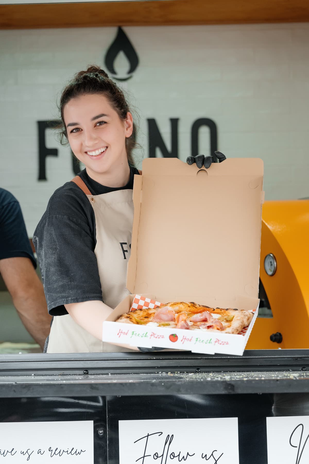 Warm hospitality moment at a Forno Via catered wedding celebration in Seattle