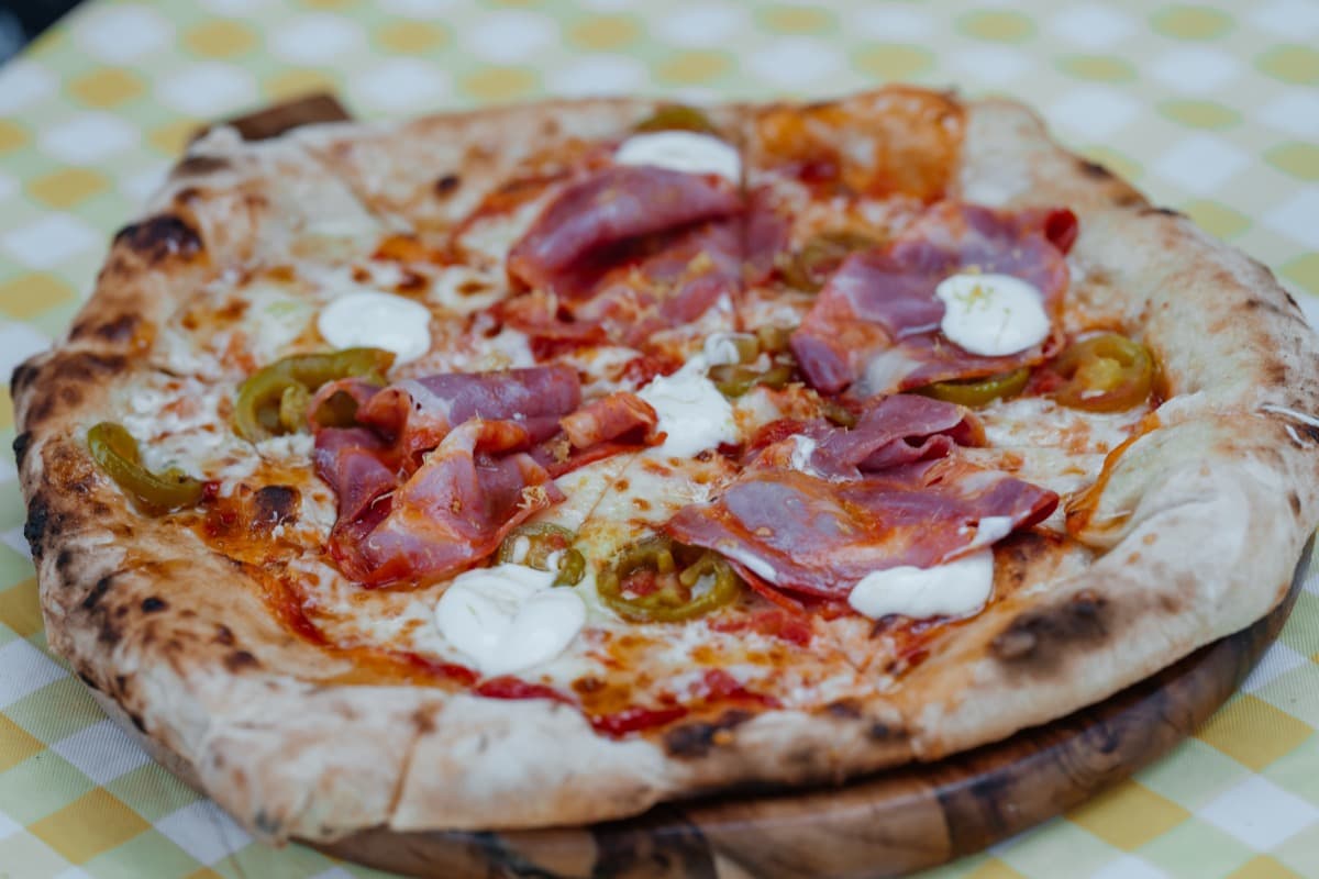 Forno Via branded catering trailer at an outdoor wedding venue in the Pacific Northwest